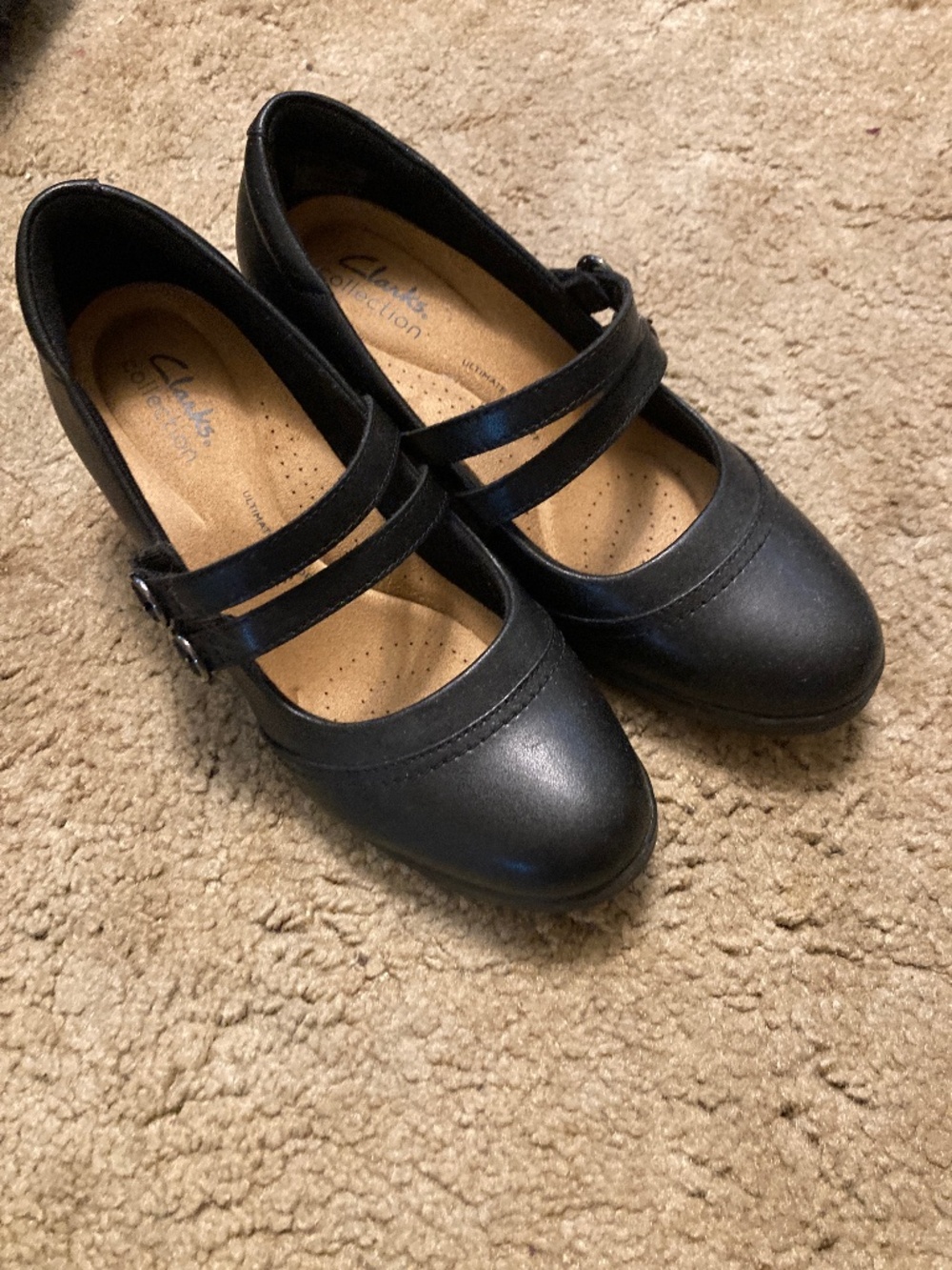 Clark’s black heels with strap